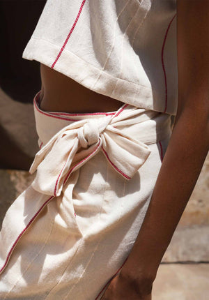 Zunguka wrap pants Hadithi